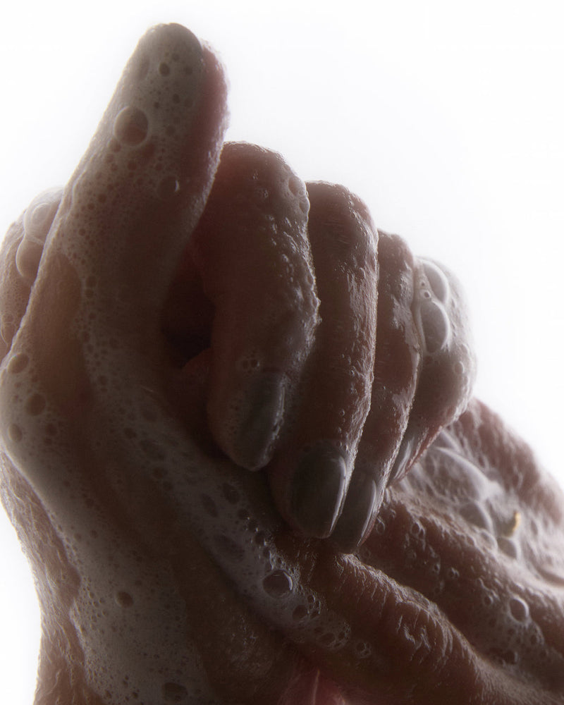 Most routines treat surface symptoms. We start with water: tackling dryness, dullness, and buildup at their source.